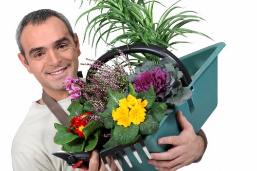 Gardeners Whitechapel applying safe working methods outdoors