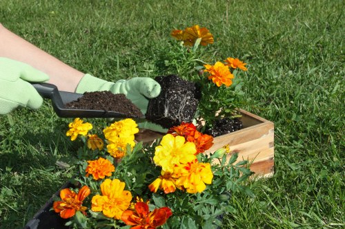Whitechapel gardeners working on seasonal planting and borders
